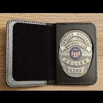 PROP: Michael Long badge